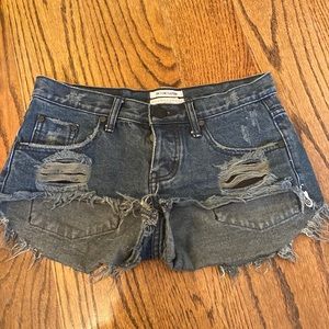Denim shorts. Dark wash.